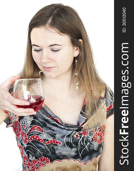 Young Woman with Beautiful Green Eyes Drinking Glass of Wine