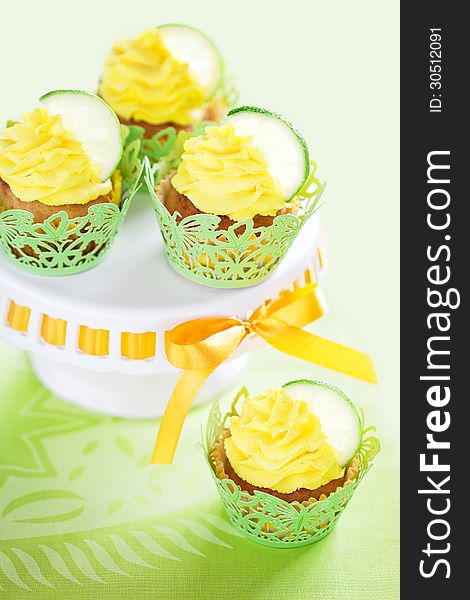 Lime cupcake with lemon cream, selective focus