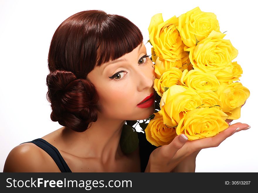 The girl with a bouquet of yellow roses. The girl with a bouquet of yellow roses