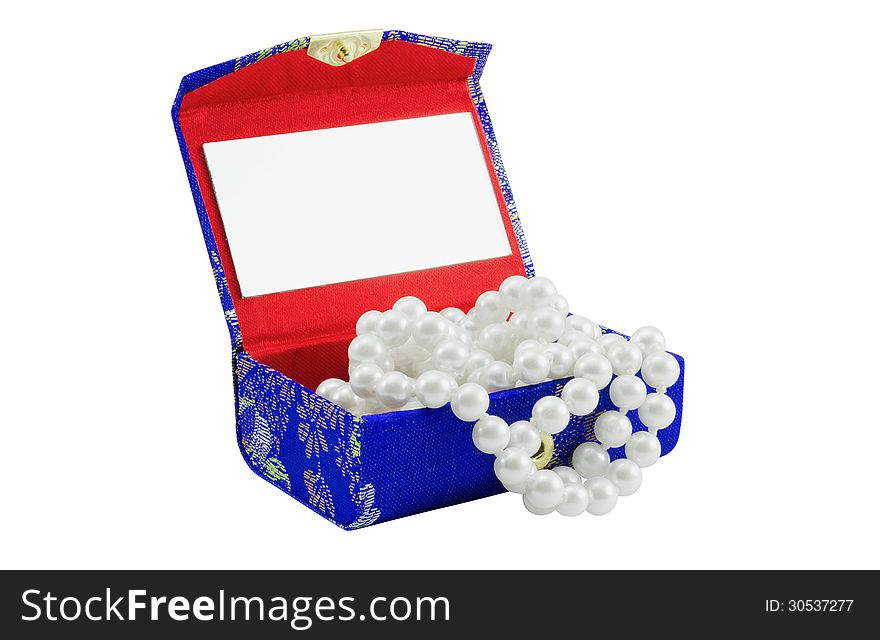 Small Casket with a necklace from pearls of dark blue colour, separately on a white background. Small Casket with a necklace from pearls of dark blue colour, separately on a white background