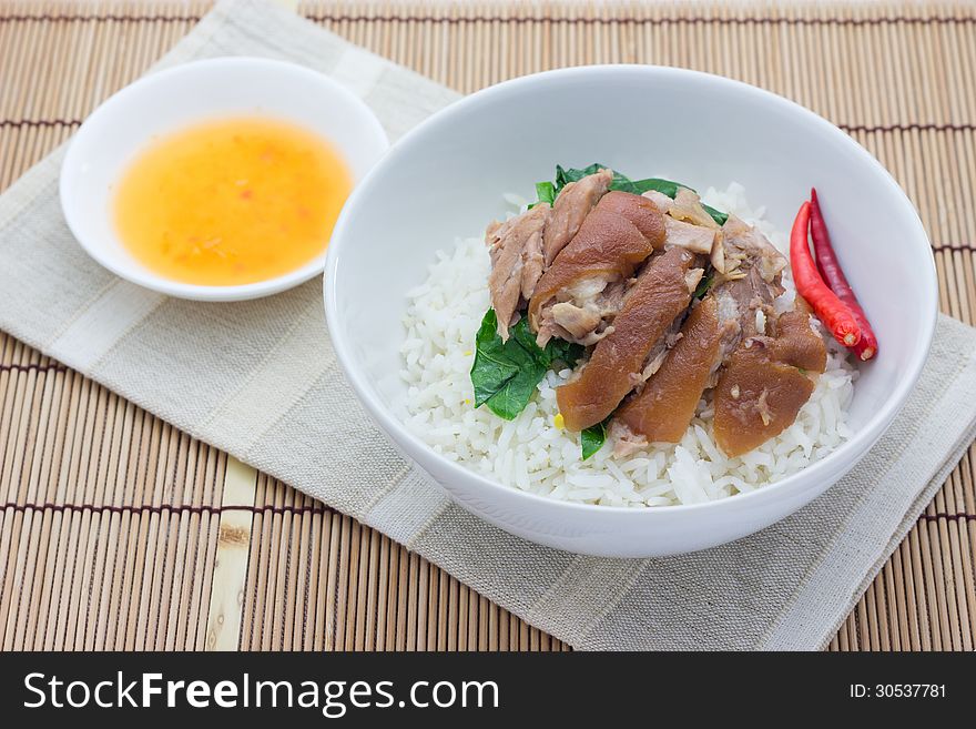 Braised Pork with Mei Gan Cai on plain rice. Braised Pork with Mei Gan Cai on plain rice