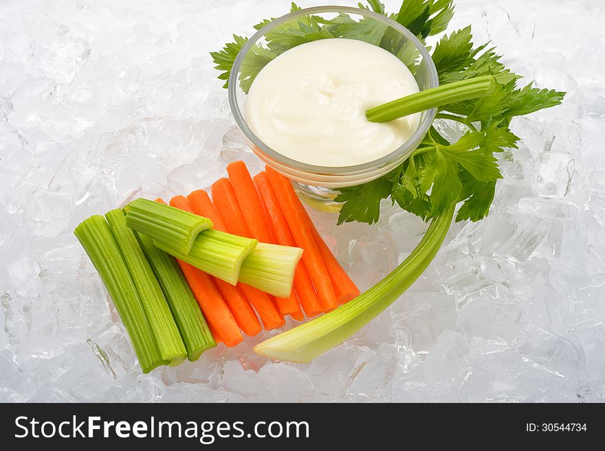 Vegetables and salad cream on ice