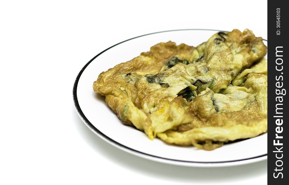 Oyster omelet fire with egg, thai food on white background