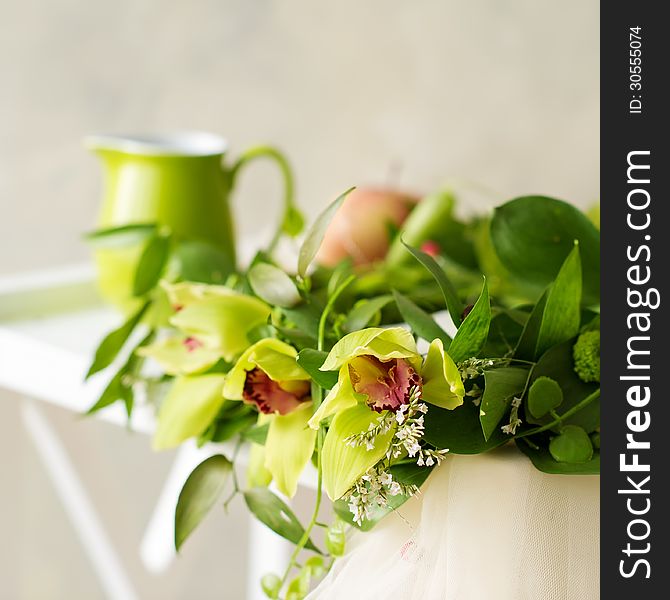 Closeup beautiful bridal wreath with yellow orchids. Closeup beautiful bridal wreath with yellow orchids