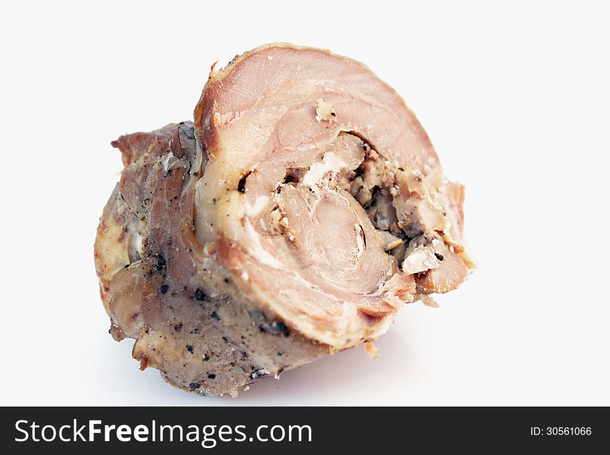 Roasted meat on the white background (details)