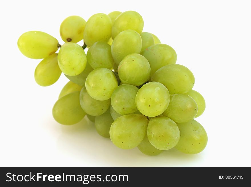 Bunch of grapes on a light background (details). Bunch of grapes on a light background (details)