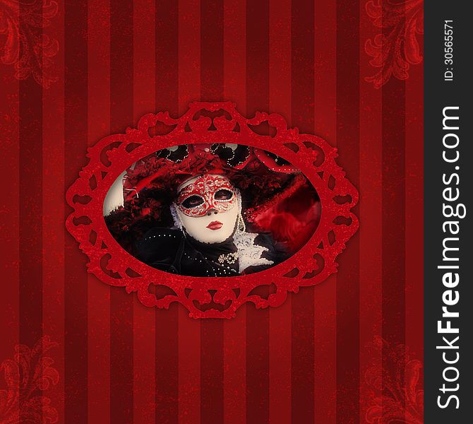 Black and red venetian carnival on vintage grunge red background. Black and red venetian carnival on vintage grunge red background