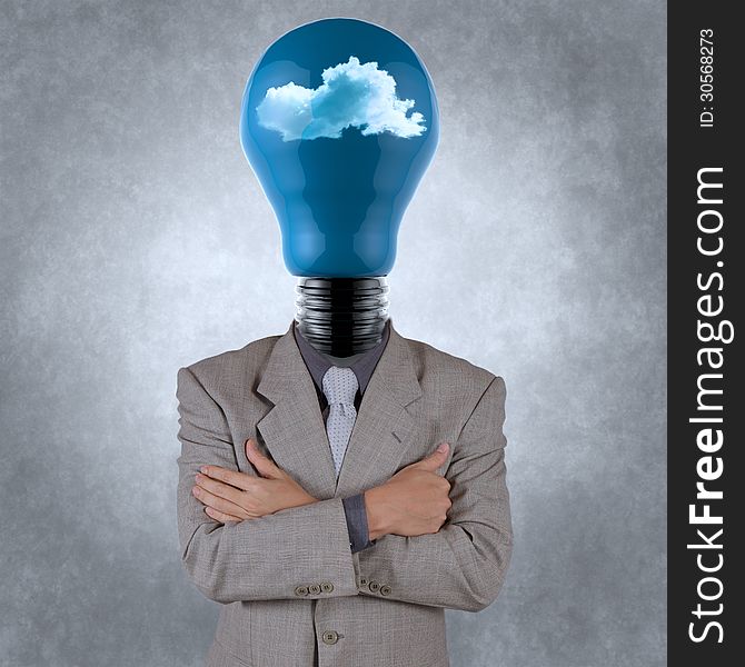 Businessman with lightbulb head with the clouds as concept. Businessman with lightbulb head with the clouds as concept