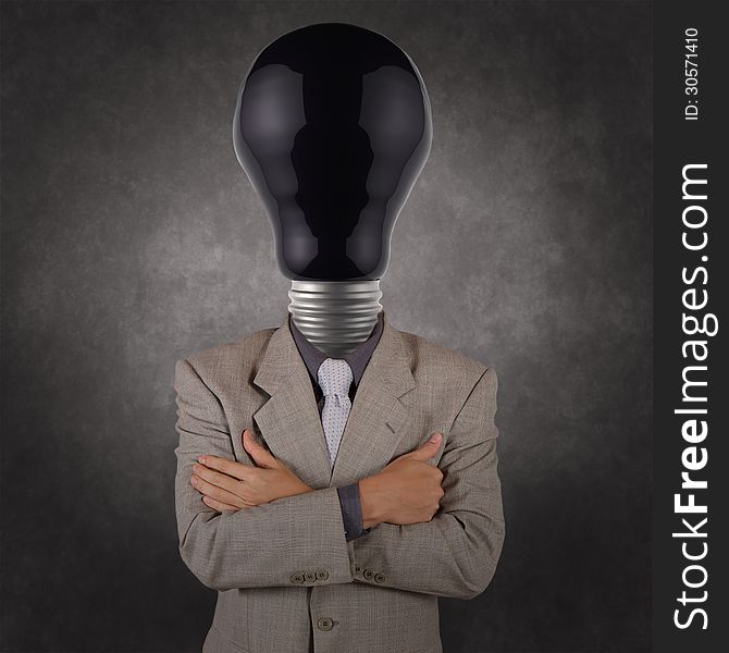 Businessman with black light bulb head as concept