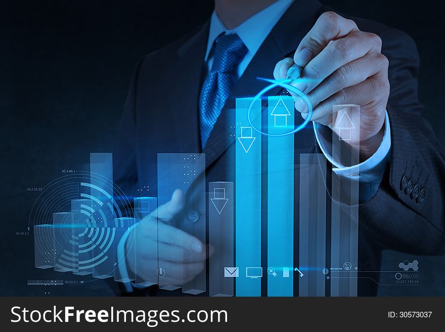 Businessman Hand Drawing Virtual Chart Business