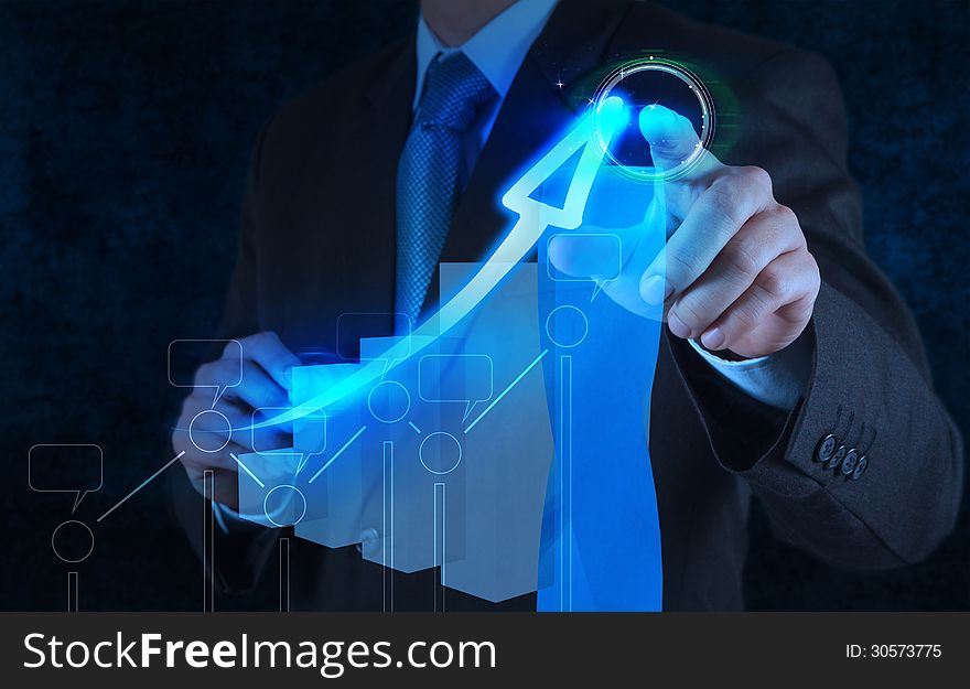 Businessman hand drawing virtual chart business on touch screen computer