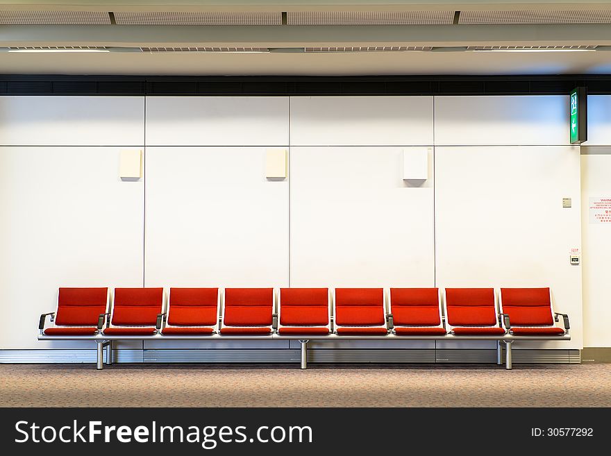 armchair in waiting area of hongkong airport