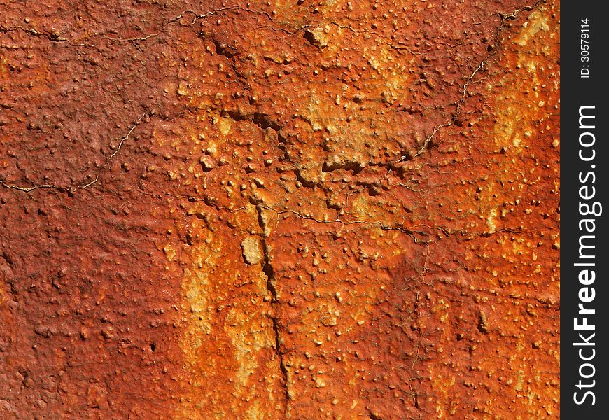 Old rusty wall in the sun. Old rusty wall in the sun