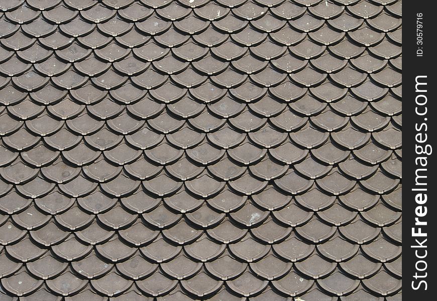 Pattern of ancient black roof in Thai temple