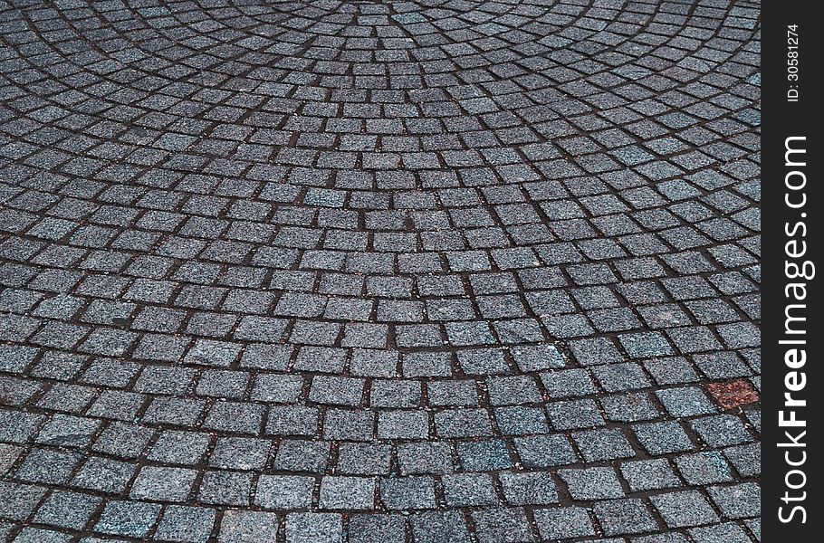 The gray pavement, built of stones in a semicircle in Dresden, Germany. The gray pavement, built of stones in a semicircle in Dresden, Germany