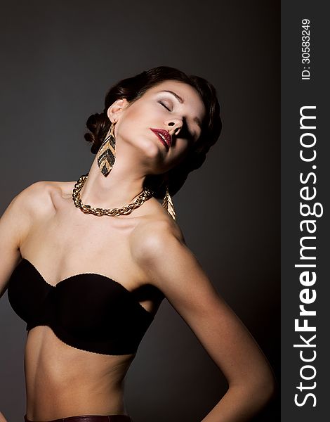 Bliss. Sultry Graceful Beauty In Black Bra With Golden Jewelery - Necklace And Earrings