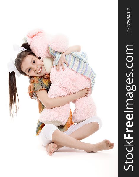 Little Girl And Teddy Bear on white background