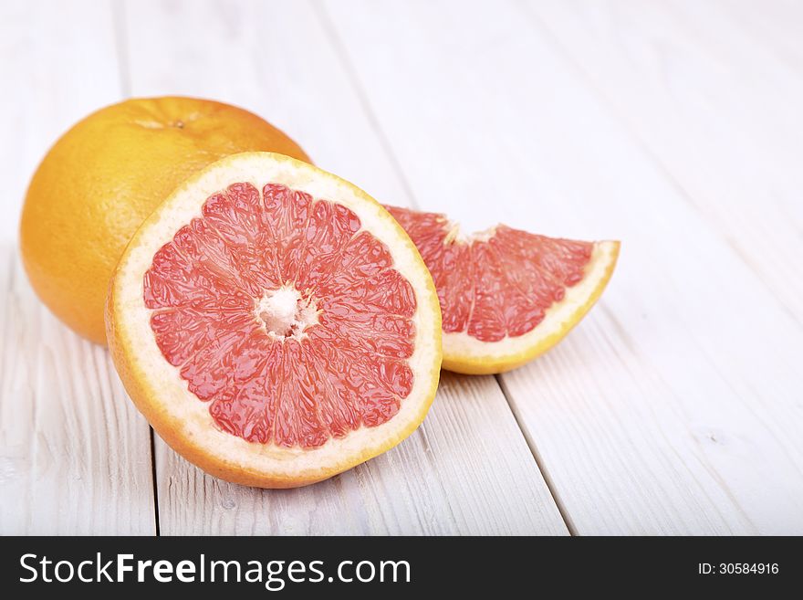 Grapefruit On A  Wooden Background. Selective Focus