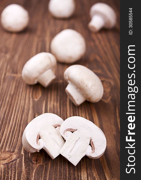 Sliced Champignons On A Wooden Background, Selective Focus