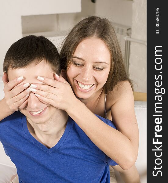 Close up portrait of pretty young couple. man and woman hugging