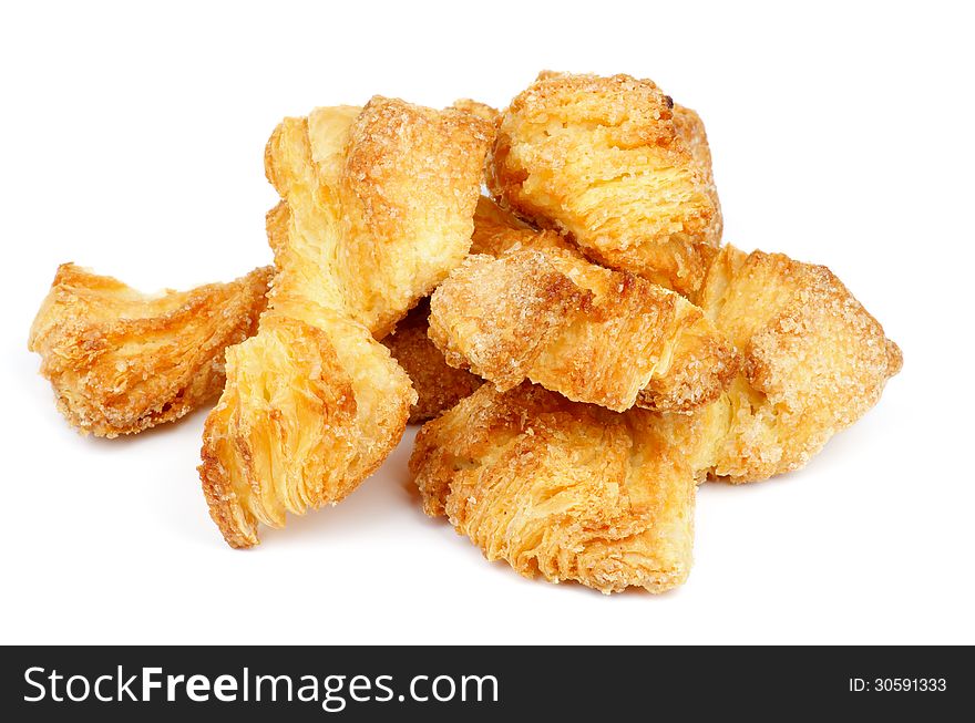 Heap of Delicious Puff Pastry Bakery Bows isolated on white background