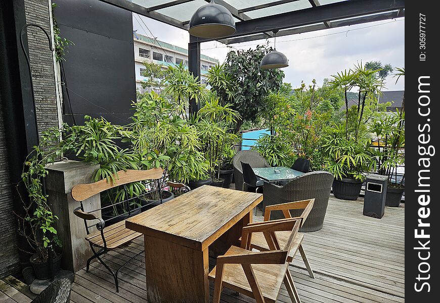 The Outdoor Terrace With Plants Is Suitable For Relaxing