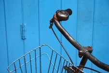 Old Bicycle Against Blue Door Royalty Free Stock Photo