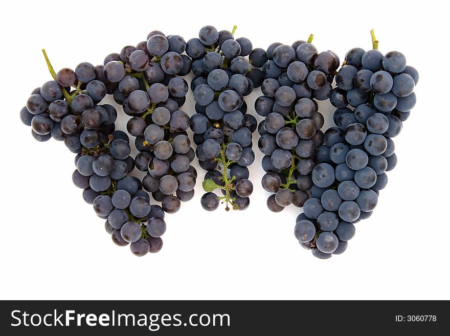 Fresh dark grape isolated over white background