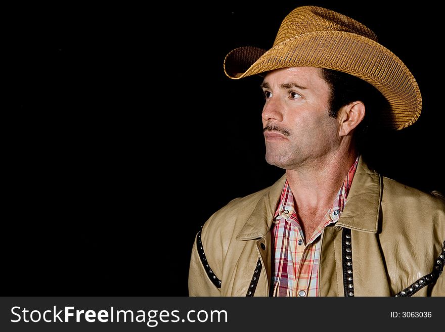 Portrait of a cowboy wearing cowboy hat