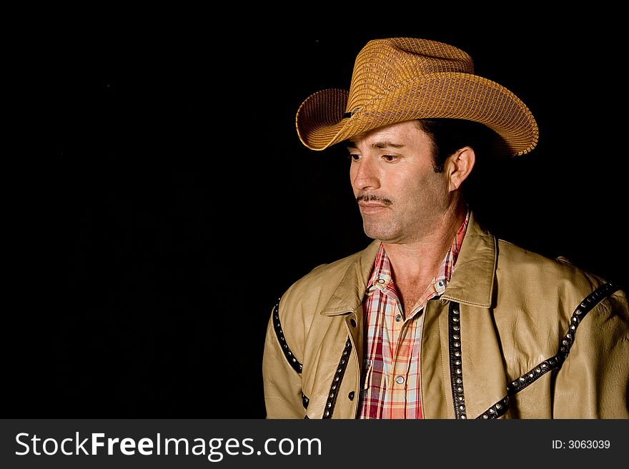 Portrait of a cowboy wearing cowboy hat
