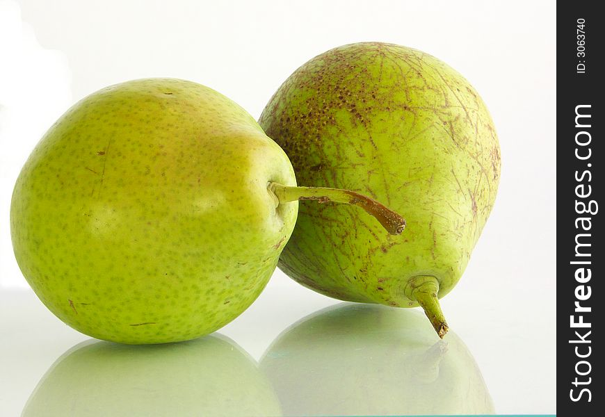 Two pears on a white background. Was on a glass substrate.