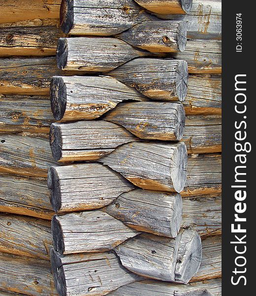 Detail of the exterior of an old log cabin. Detail of the exterior of an old log cabin