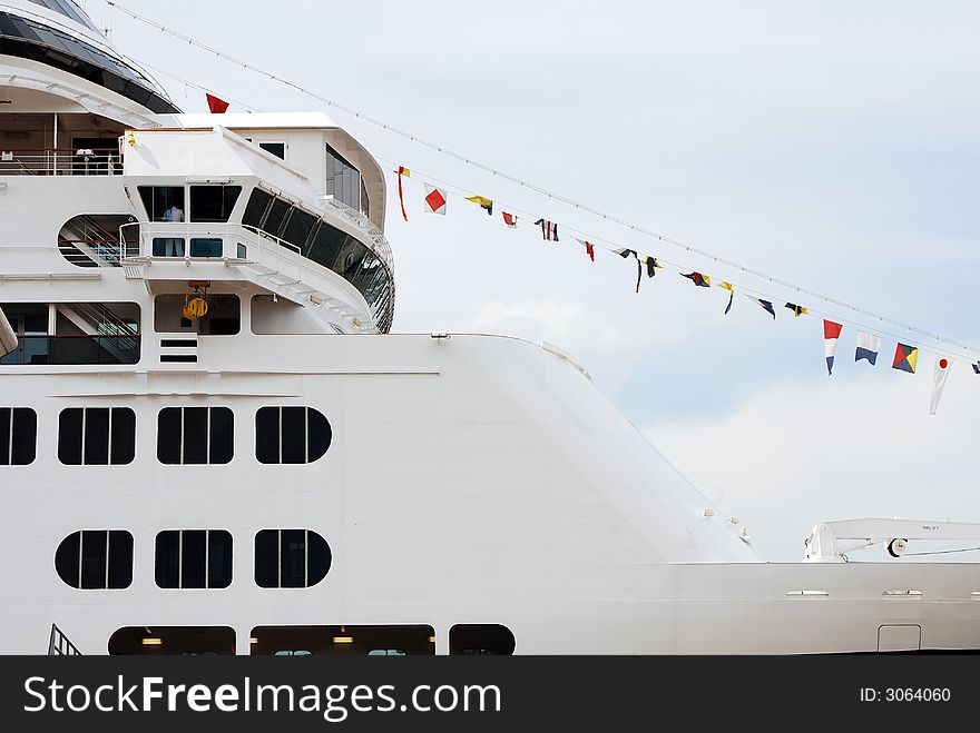 A cruiseship in the port of the city of Rotterdam (Holland). A cruiseship in the port of the city of Rotterdam (Holland)