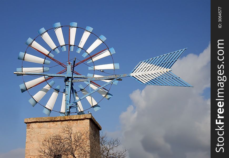 White and Blue Windmill in the island of Majorca (Spain)