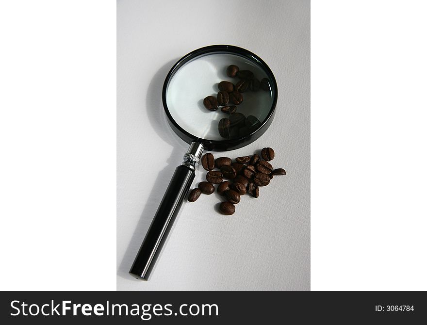 Coffee under a magnifier (grains). Coffee under a magnifier (grains)