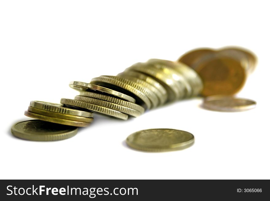 Isolated pile of coins lying horizontally. Isolated pile of coins lying horizontally