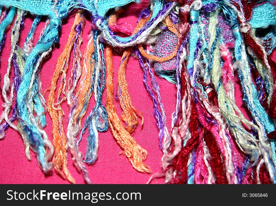 Colorful cotton scarf fringes - detail. Colorful cotton scarf fringes - detail