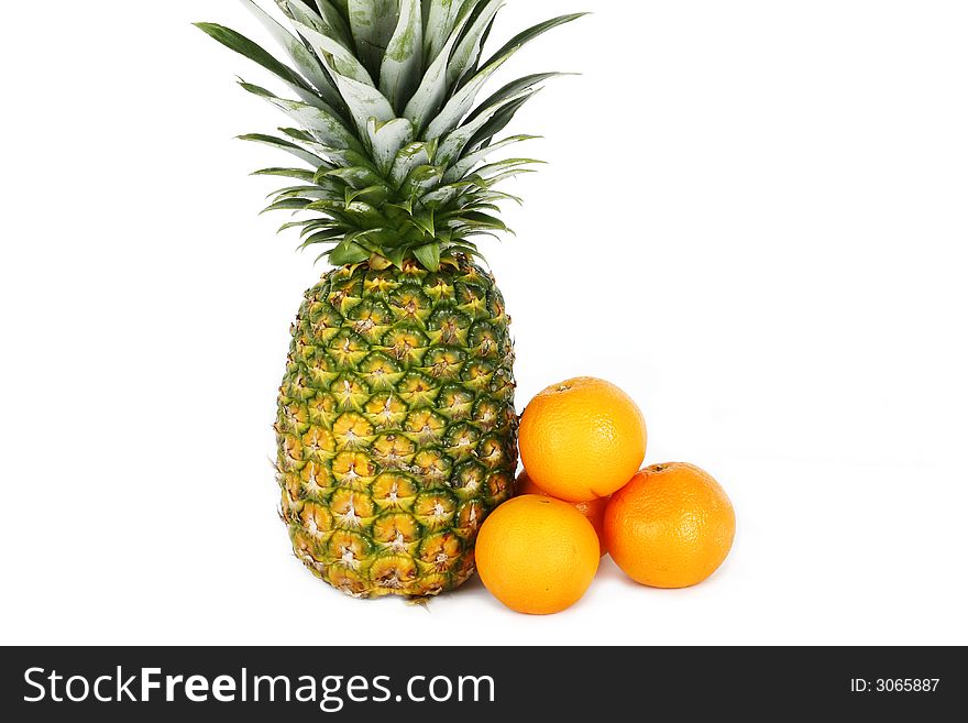 Fresh pineapple and fruits on white background