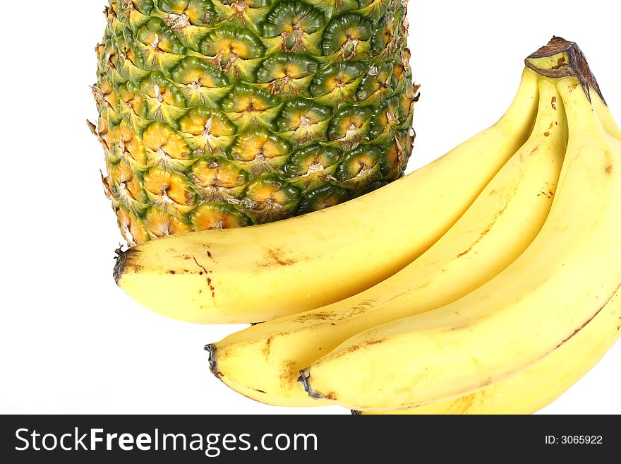 Fresh pineapple and fruits on white background