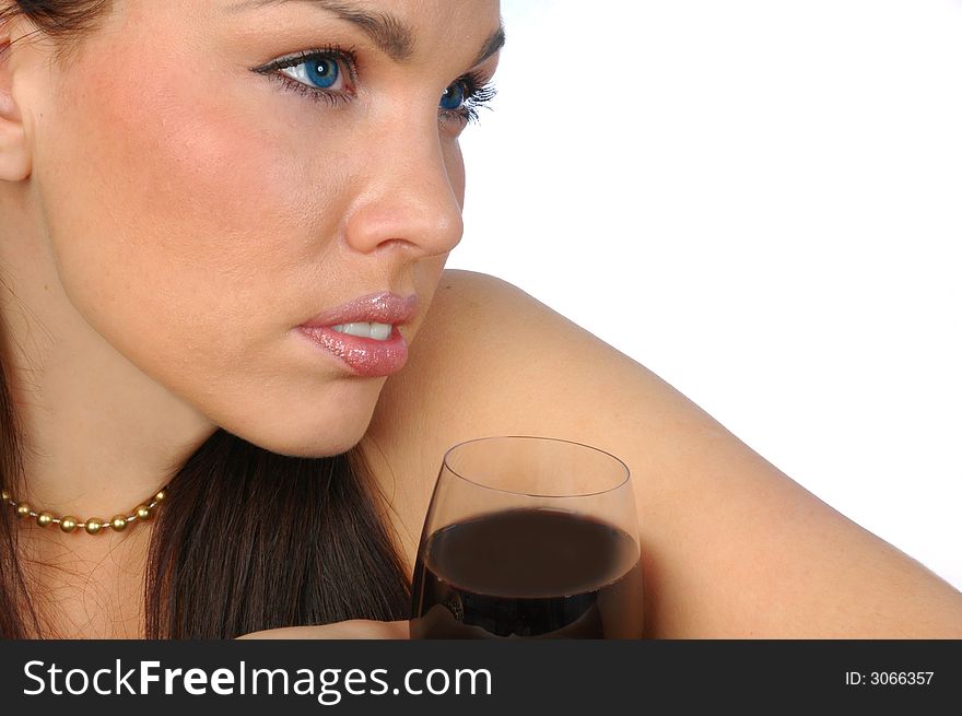 Thoughtful brunette with red wine isolated on white