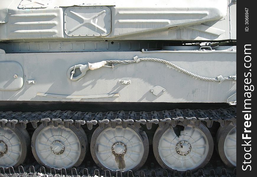 The lateral side of military white tank. The lateral side of military white tank