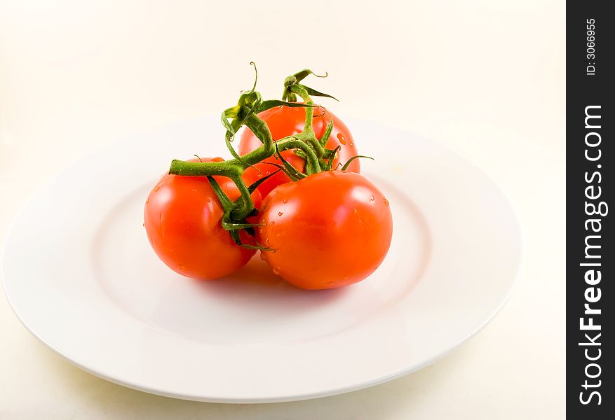 Stack of tomatoes-isolated on white.