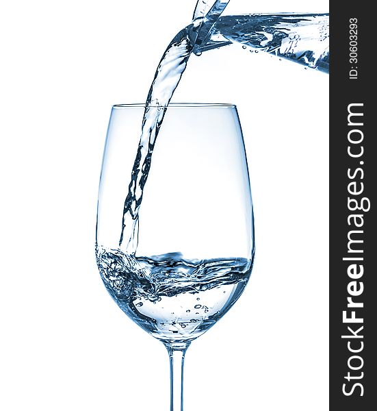 Mineral water being poured into a glass. Mineral water being poured into a glass