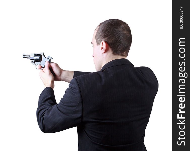 Professional man who keeps a gun pointing it at a target on a white background. Professional man who keeps a gun pointing it at a target on a white background