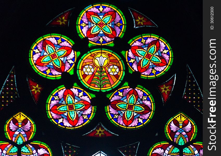 The stained glass window in a votive church, Vienna