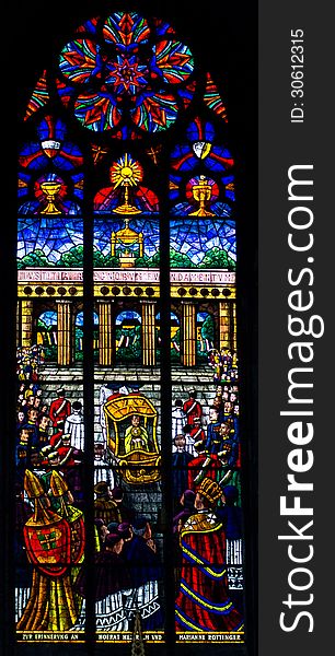 The stained glass window in a votive church, Vienna