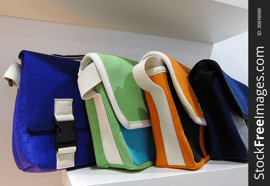 The different color textile handbags for young people. The different color textile handbags for young people