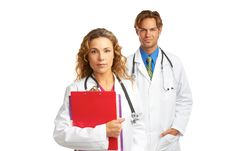 Young Serious Doctor And Nurse Royalty Free Stock Photography Young Serious Doctor And Nurse Royalty Free Stock Photography