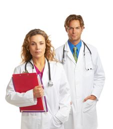 Young Serious Doctor And Nurse Stock Photo Young Serious Doctor And Nurse Stock Photo