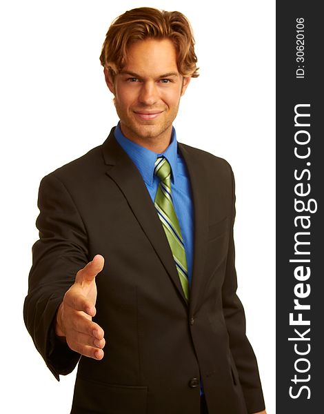 Business man in suit offering a handshake isolated on white background.